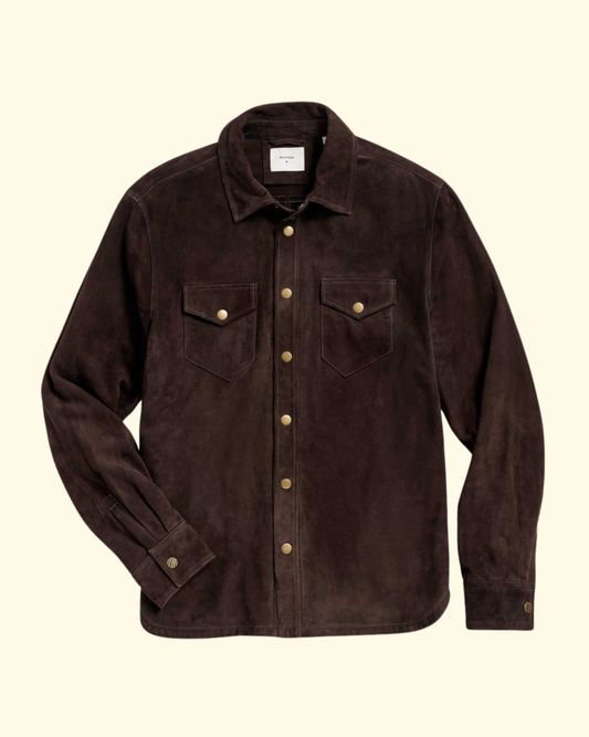 Brown suede jacket with gold buttons on a beige background