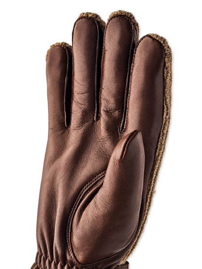 Hestra Christopher light brown palm detail, AI-edited background