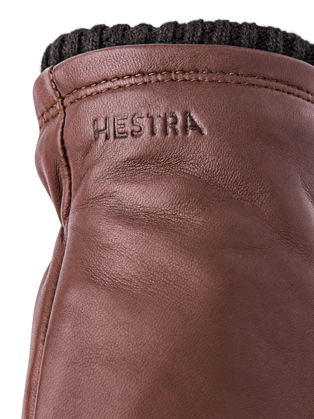 Hestra John brown cuff detail, AI-edited background